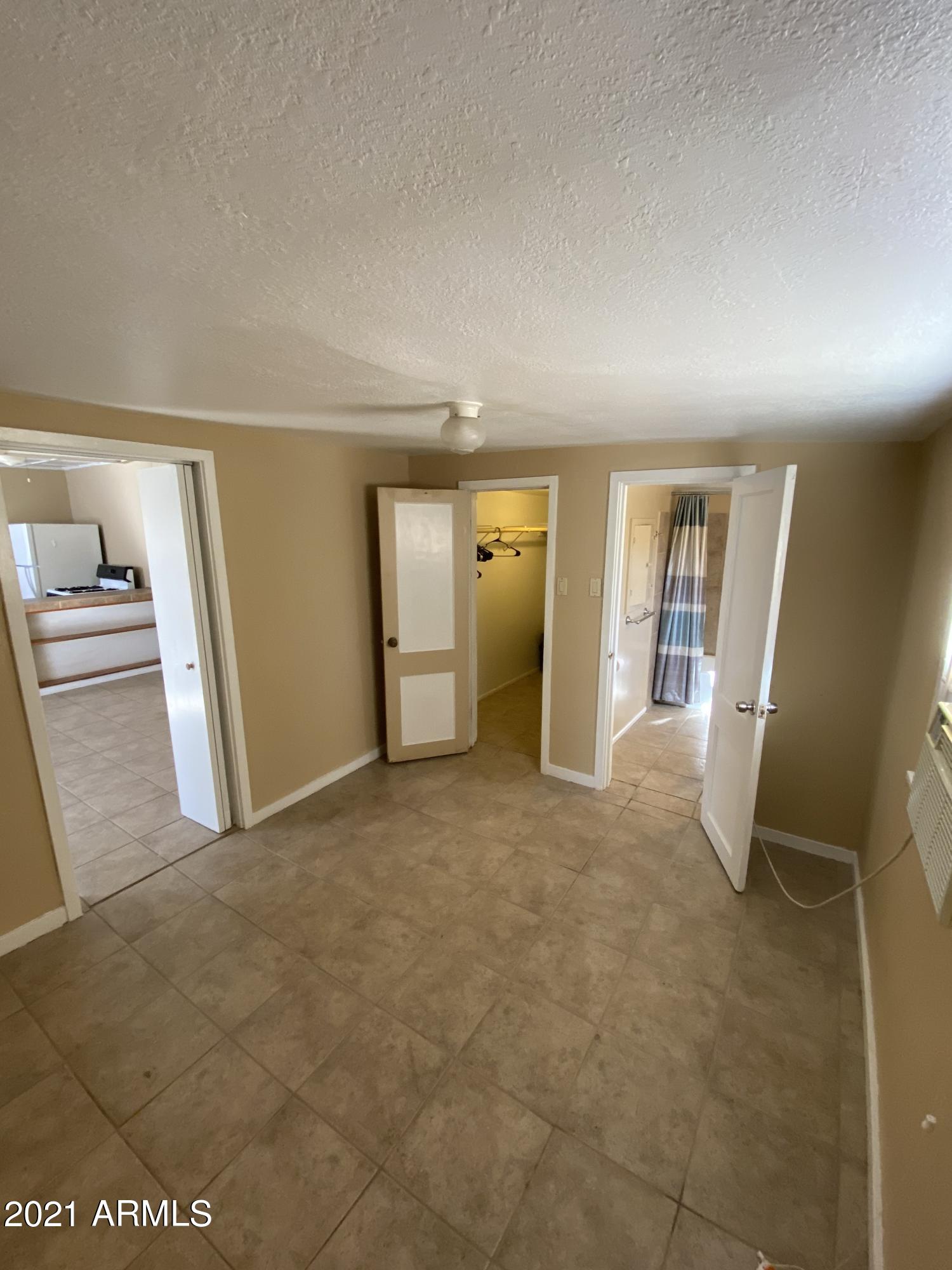 1037 North 25th Street, Unit 2 Phoenix, AZ 85008 - Photo 8 of 18 a view of a livingroom with a furniture