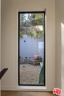 a view of a living room and a window