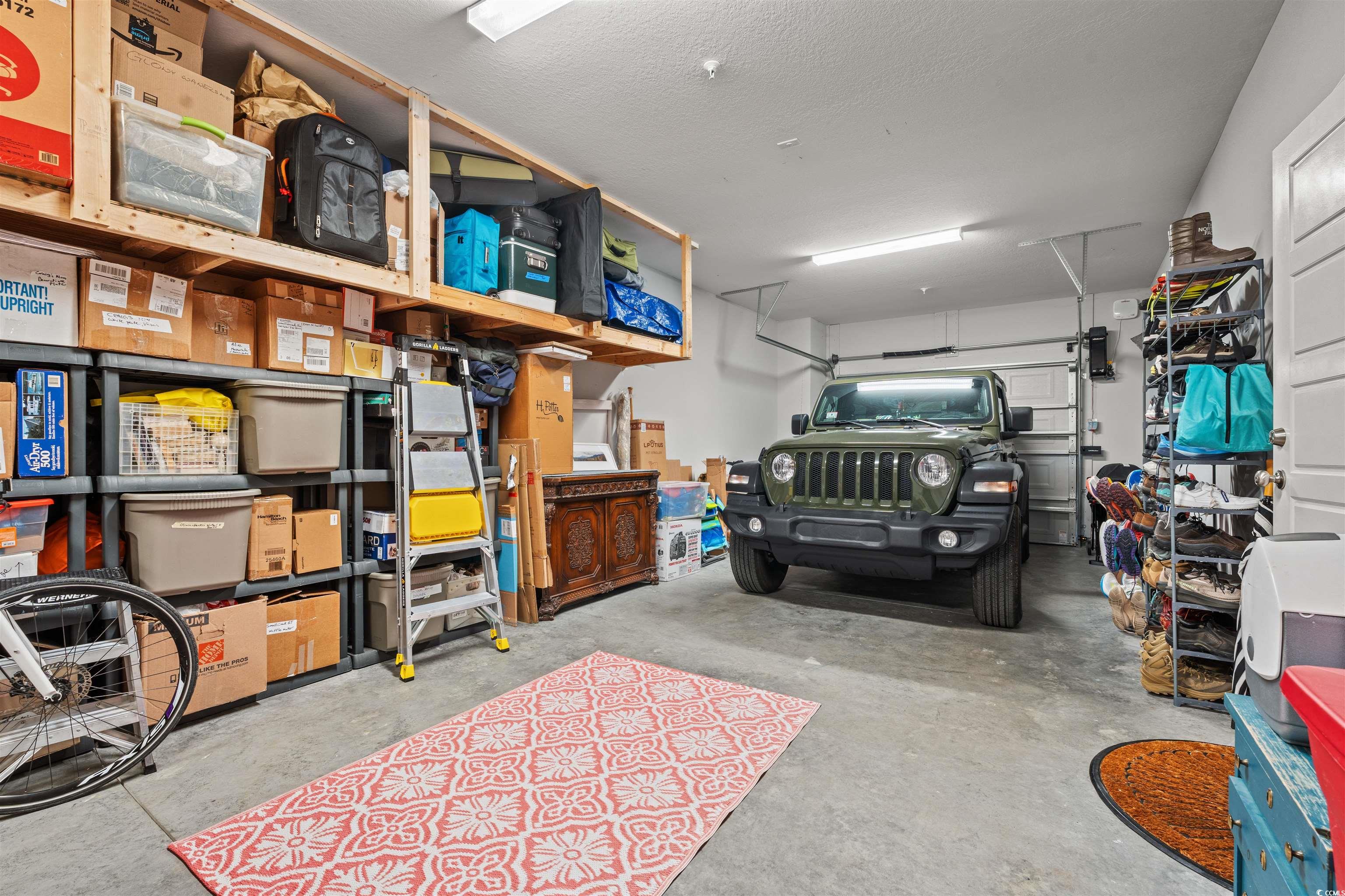 933 Jackline Place, Unit 101 Murrells Inlet, SC 29576 - Photo 24 of 35 View of garage