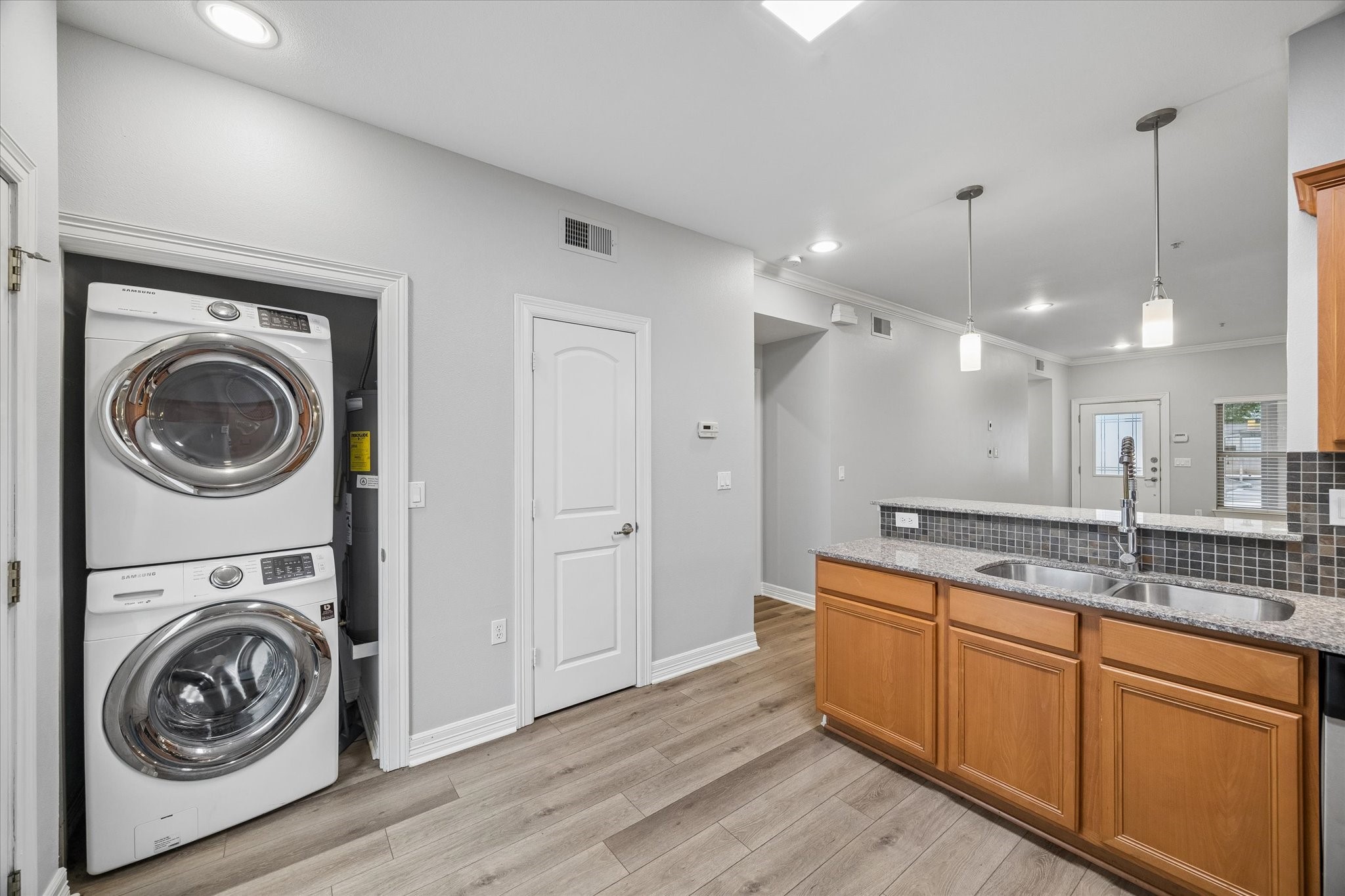 3501 Chenevert Street, Unit 7 Houston, TX 77004 - Photo 8 of 21 Stalkable washer and dryer conveniently located.