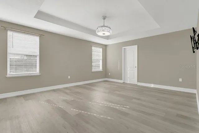 an empty room with windows