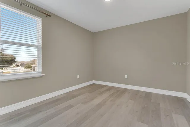 a front view of house with garden