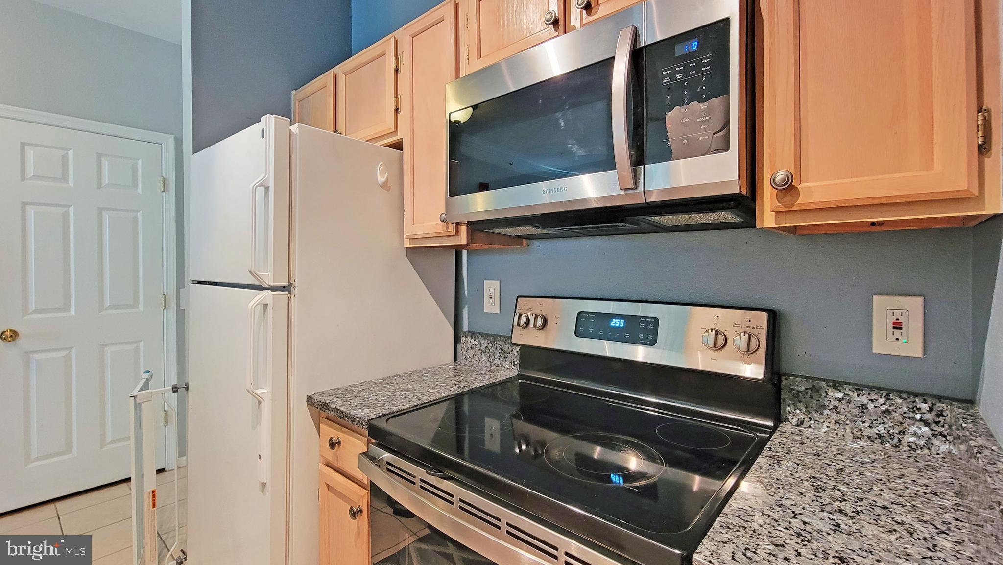 1591 Spring Gate Dr., Unit 3315 McLean, VA 22102 - Photo 12 of 69 STAINLESS STOVE & MICROWAVE 12/2021