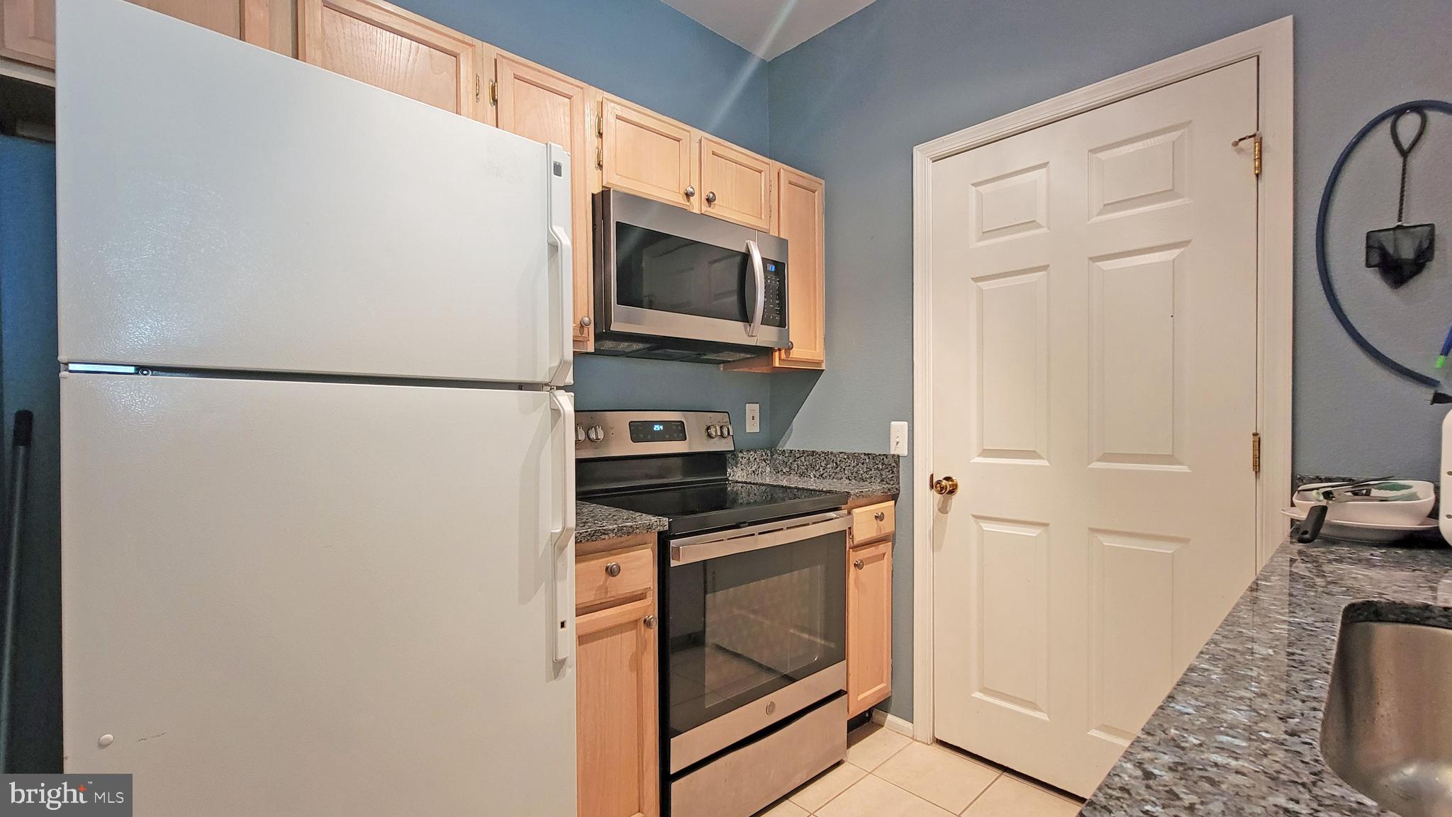 1591 Spring Gate Dr., Unit 3315 McLean, VA 22102 - Photo 14 of 69 LAUNDRY/PANTRY BEYOND