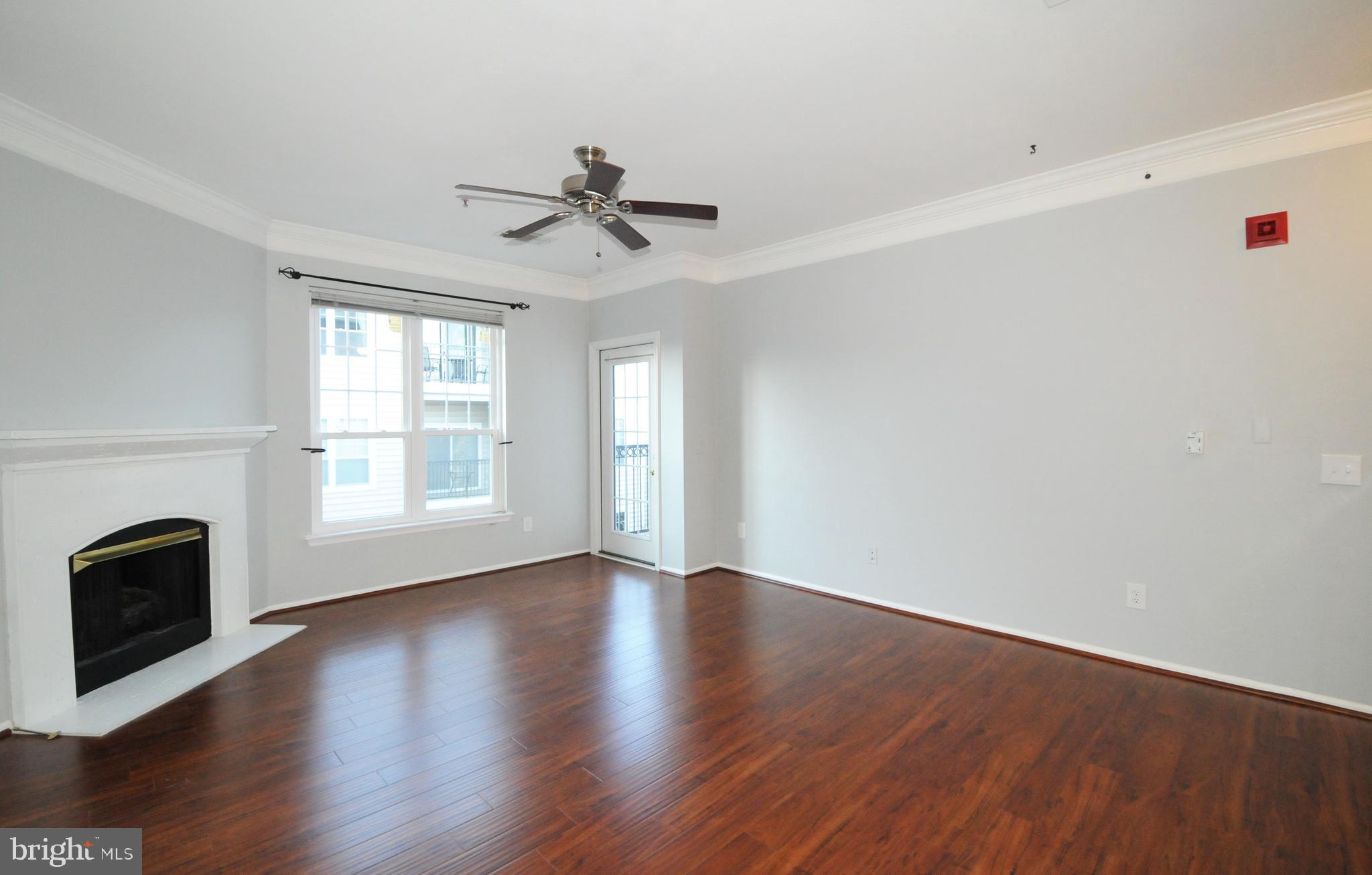 1591 Spring Gate Dr., Unit 3315 McLean, VA 22102 - Photo 24 of 69 LIVING ROOM HAS HANDSCRAPED LOOK FLOORING