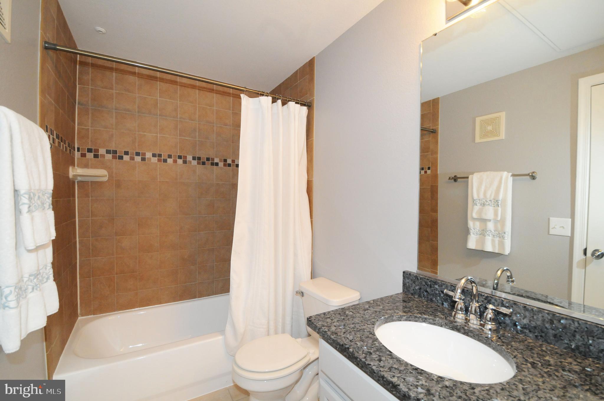 1591 Spring Gate Dr., Unit 3315 McLean, VA 22102 - Photo 33 of 69 BATHROOM WITH 2021 GRANITE COUNTER & FAUCET