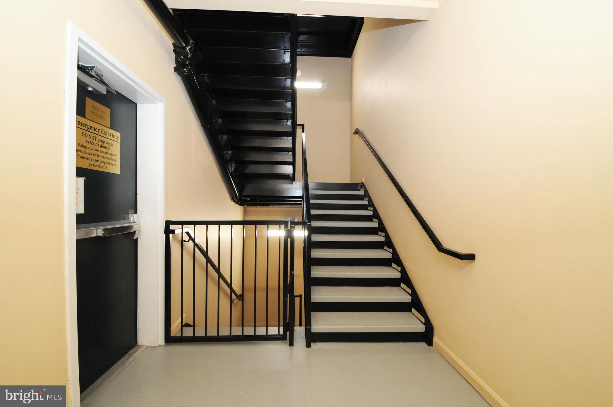 1591 Spring Gate Dr., Unit 3315 McLean, VA 22102 - Photo 4 of 69 STAIRS FROM GARAGE TO UNIT