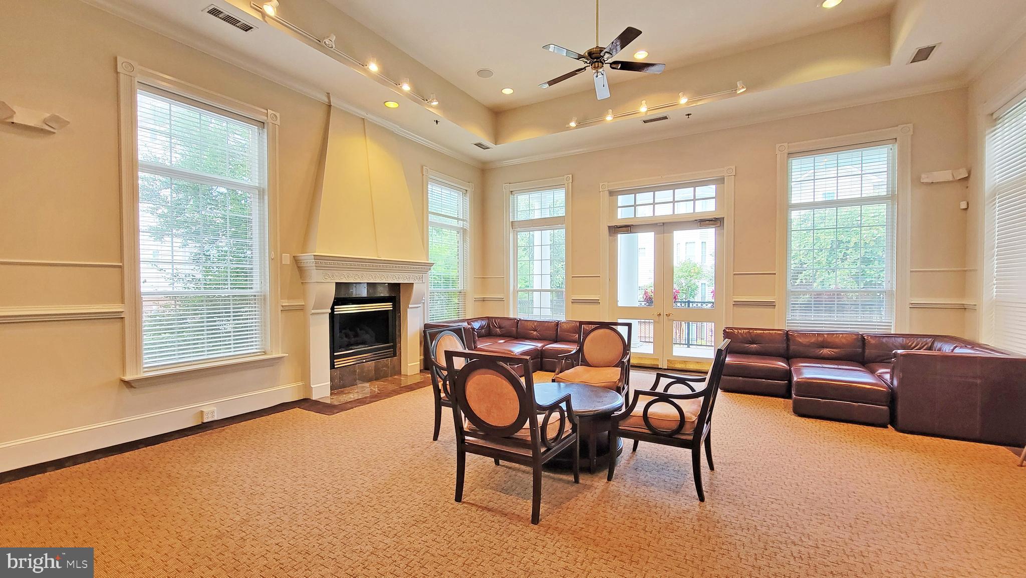 1591 Spring Gate Dr., Unit 3315 McLean, VA 22102 - Photo 42 of 69 CLUBHOUSE LOUNGE, DOORS BEYOND OVERLOOK POOL