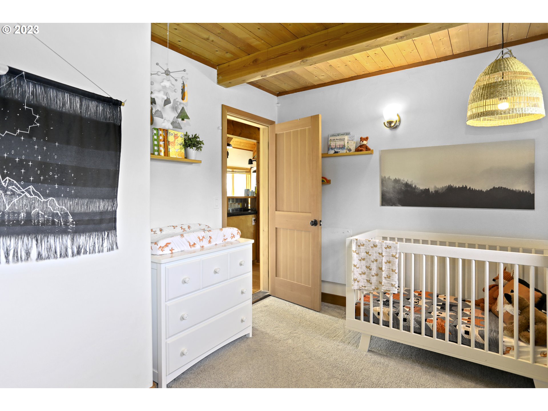 238 Acme Road White Salmon, WA 98672 - Photo 17 of 48 a bedroom with a bed and a window