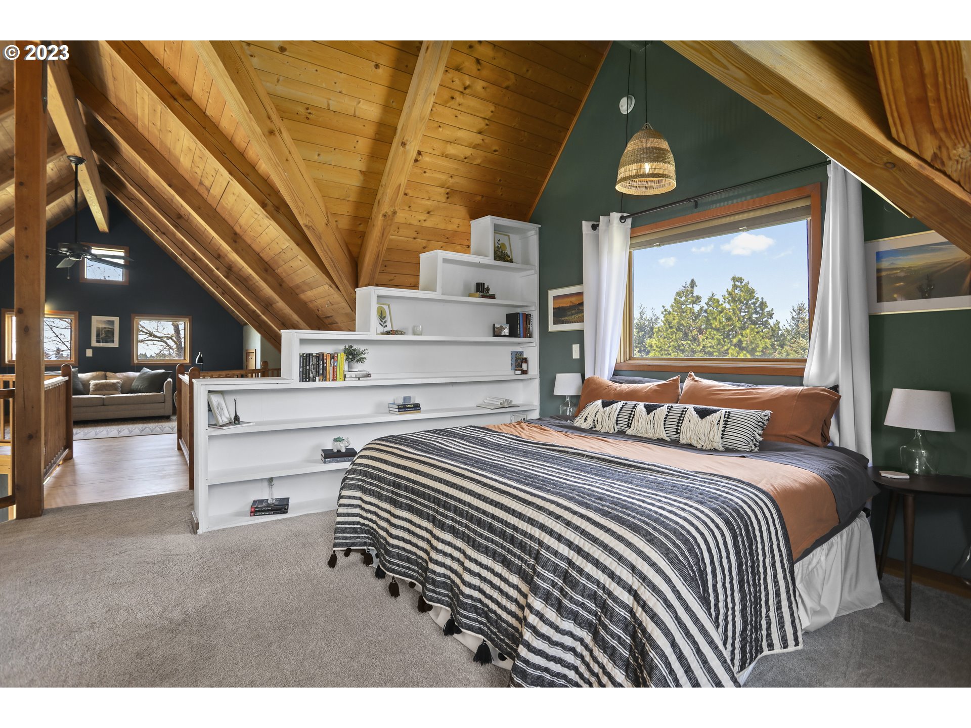 238 Acme Road White Salmon, WA 98672 - Photo 26 of 48 a bedroom with a bed and a large window