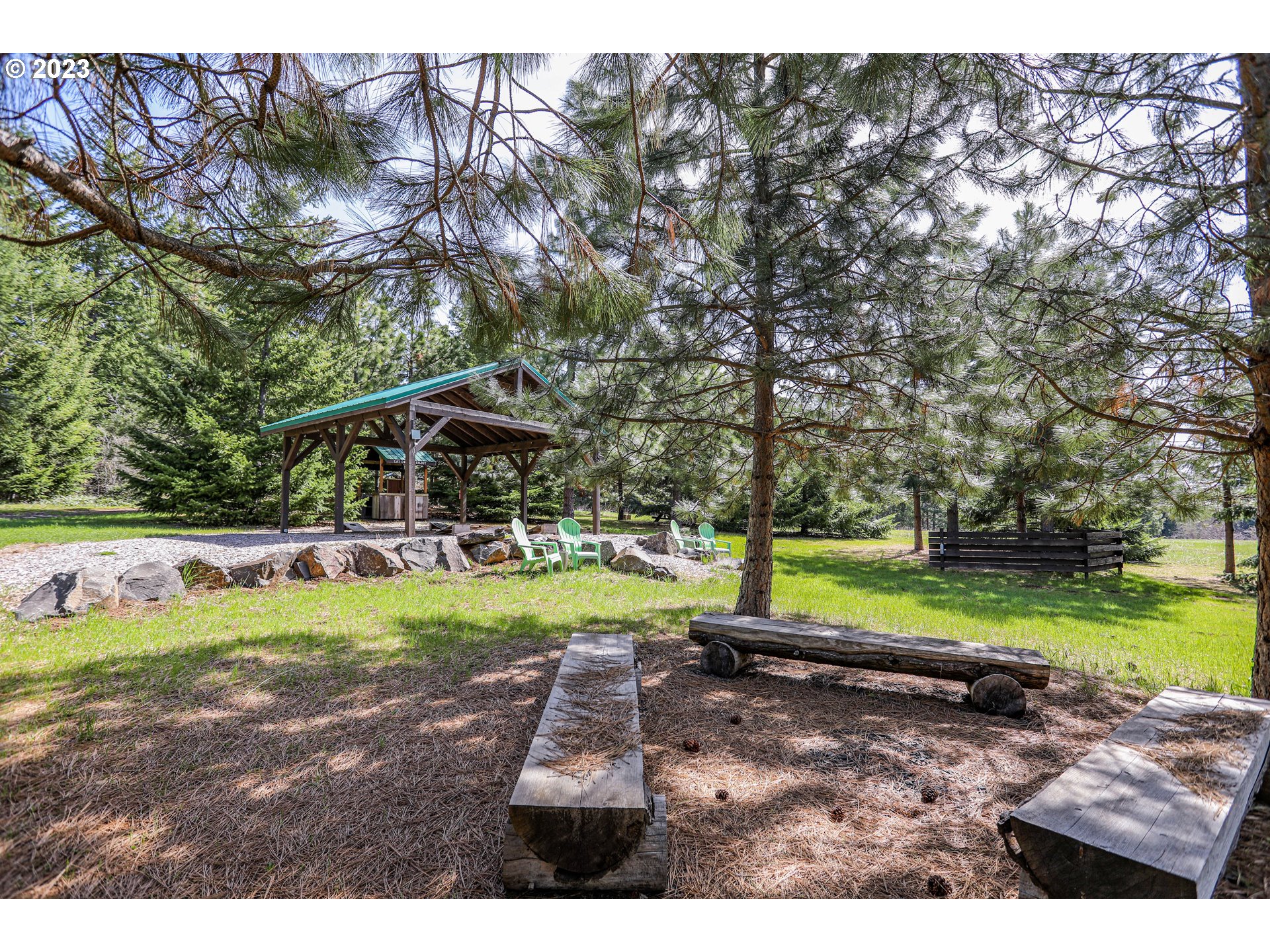 238 Acme Road White Salmon, WA 98672 - Photo 40 of 48 a view of a backyard with large trees
