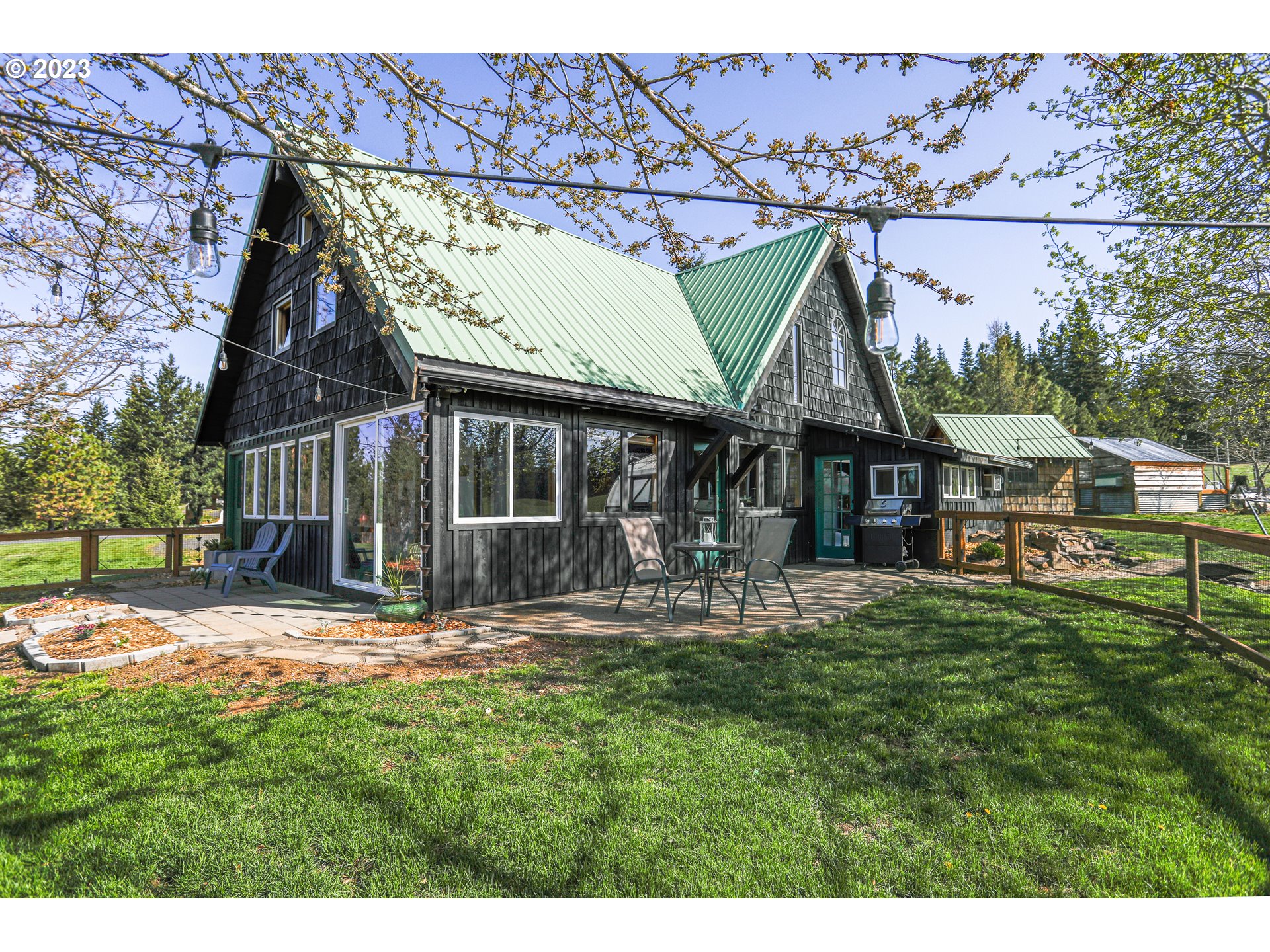 238 Acme Road White Salmon, WA 98672 - Photo 5 of 48 a view of a house with backyard