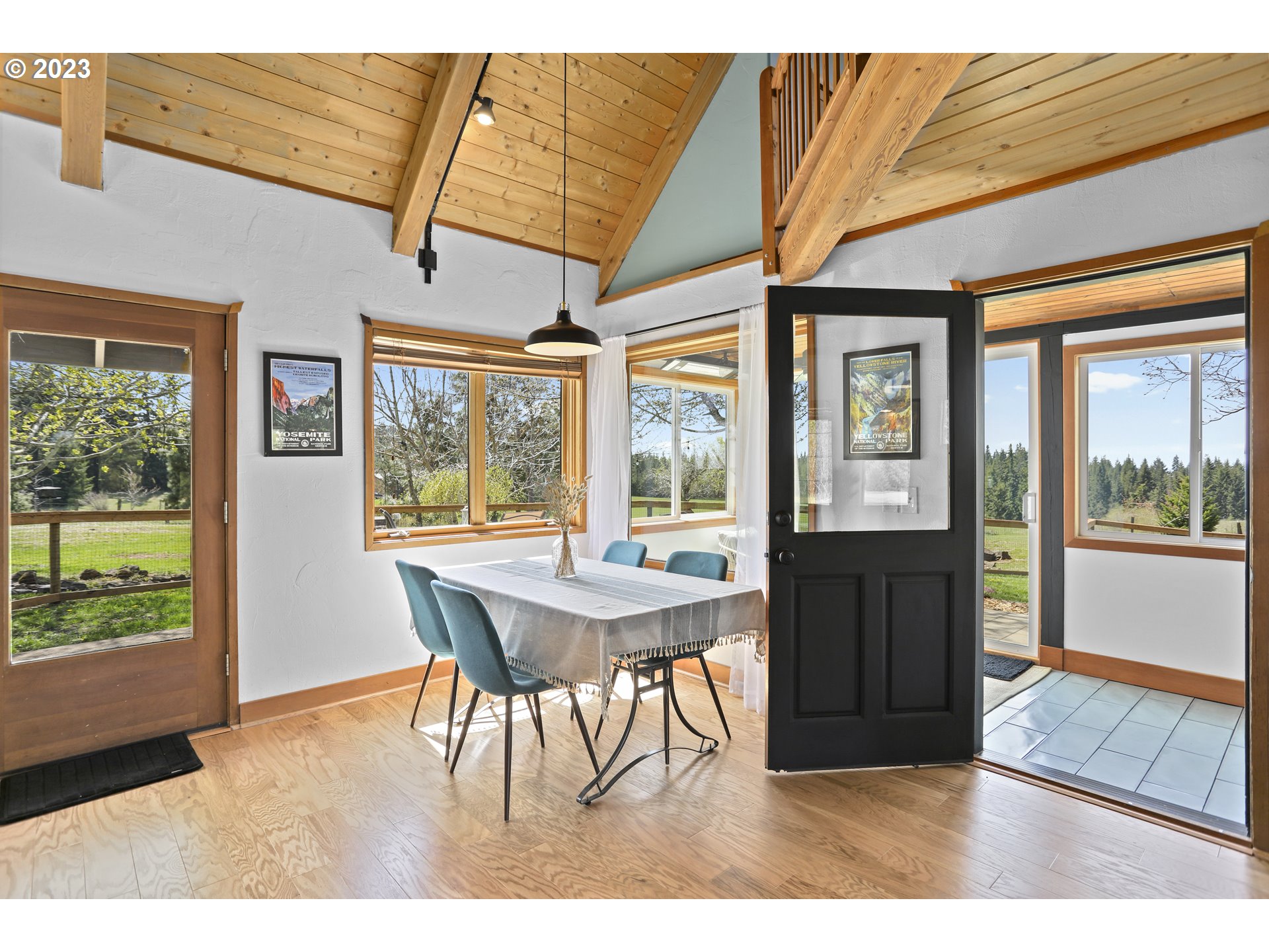238 Acme Road White Salmon, WA 98672 - Photo 10 of 48 a dining room with furniture and large windows