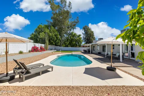 a view of a playground with a patio