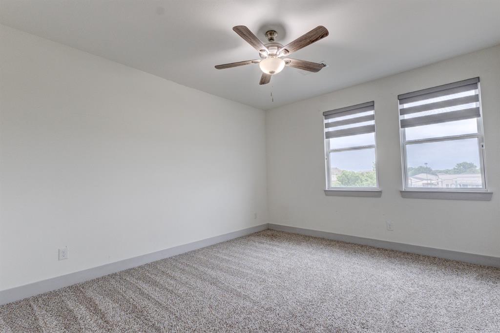 6043 Rivendell Drive Frisco, TX 75035 - Photo 28 of 38 an empty room with a window