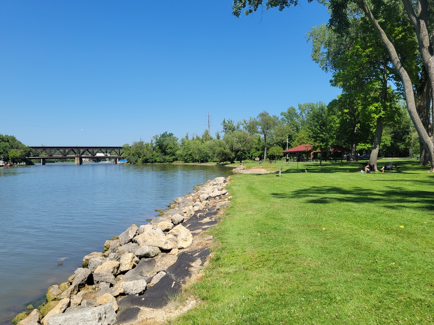 105 Grove Avenue Fox River Grove, IL 60021 - Photo 13 of 16 a view of a lake with a big yard