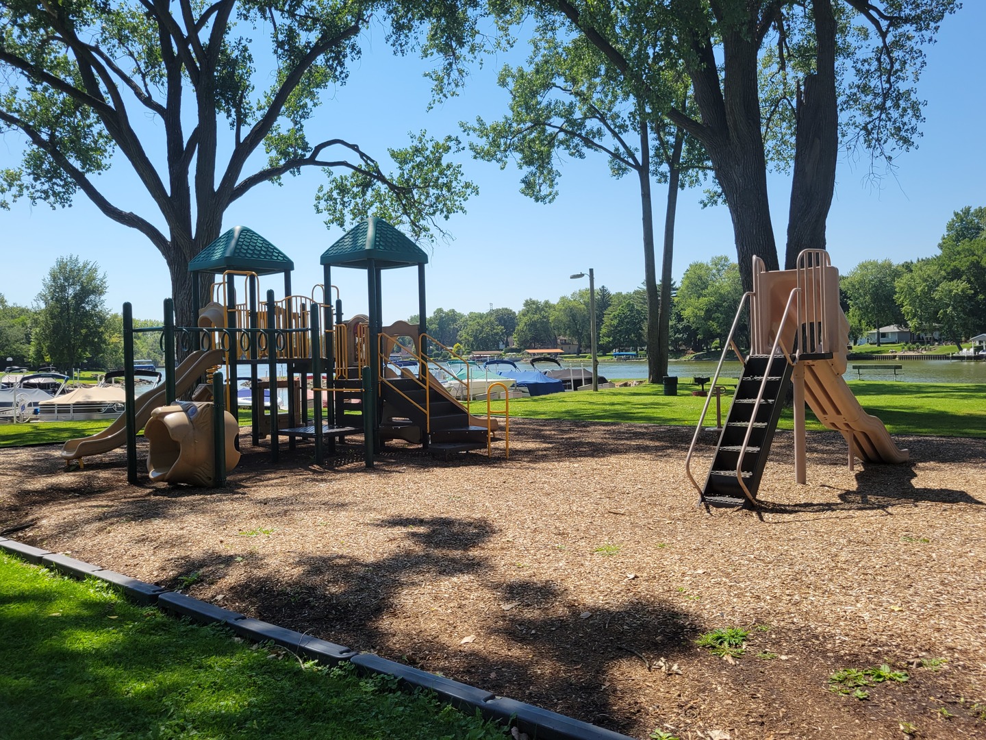 105 Grove Avenue Fox River Grove, IL 60021 - Photo 14 of 16 a view of a park with swings
