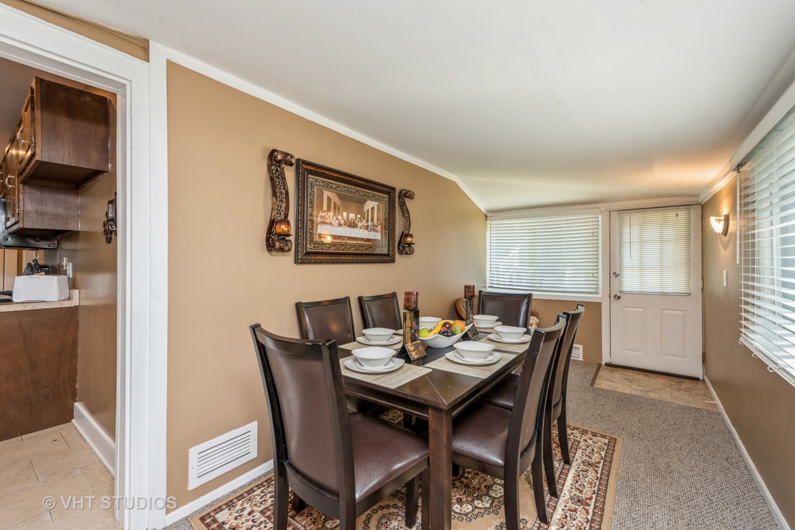 105 Grove Avenue Fox River Grove, IL 60021 - Photo 5 of 16 a view of a dining room with furniture and window