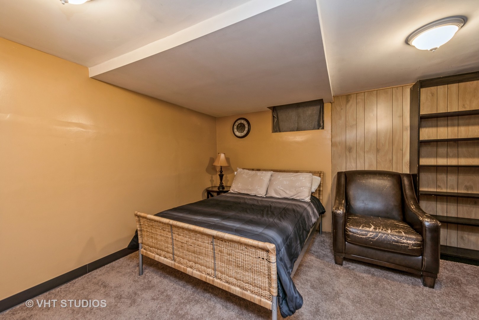 105 Grove Avenue Fox River Grove, IL 60021 - Photo 9 of 16 a bedroom with a bed and a couch