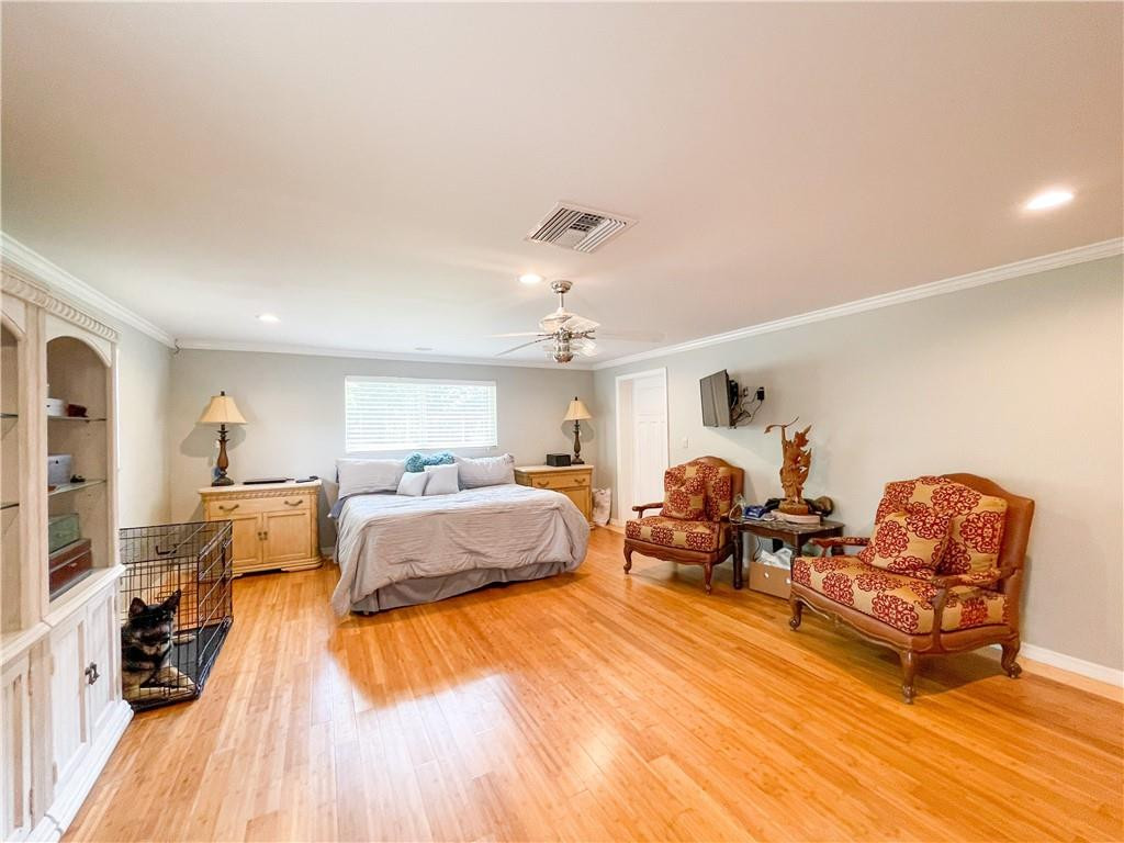 12990 Southwest 56th Street Southwest Ranches, FL 33330 - Photo 29 of 62 a living room with furniture and a wooden floor