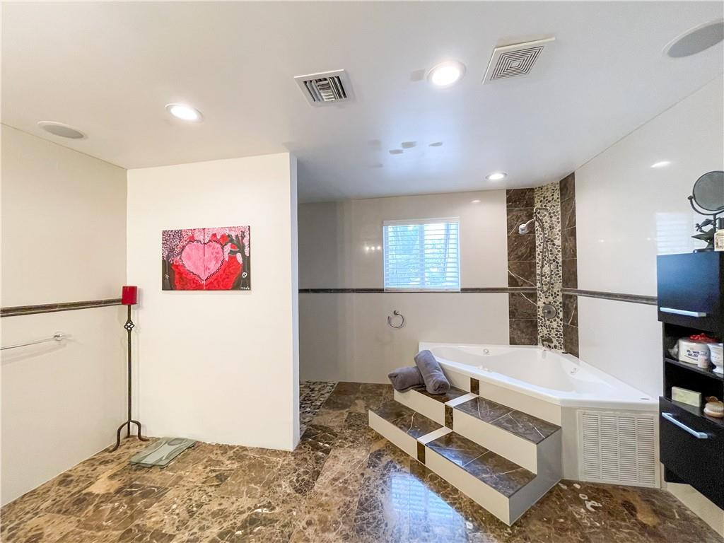 12990 Southwest 56th Street Southwest Ranches, FL 33330 - Photo 31 of 62 a living room with a couch and a dresser with wooden floor