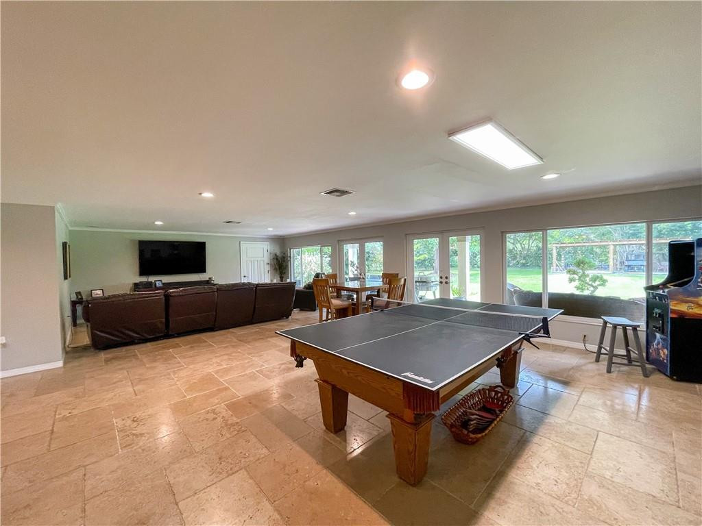 12990 Southwest 56th Street Southwest Ranches, FL 33330 - Photo 45 of 62 a room with pool table and windows