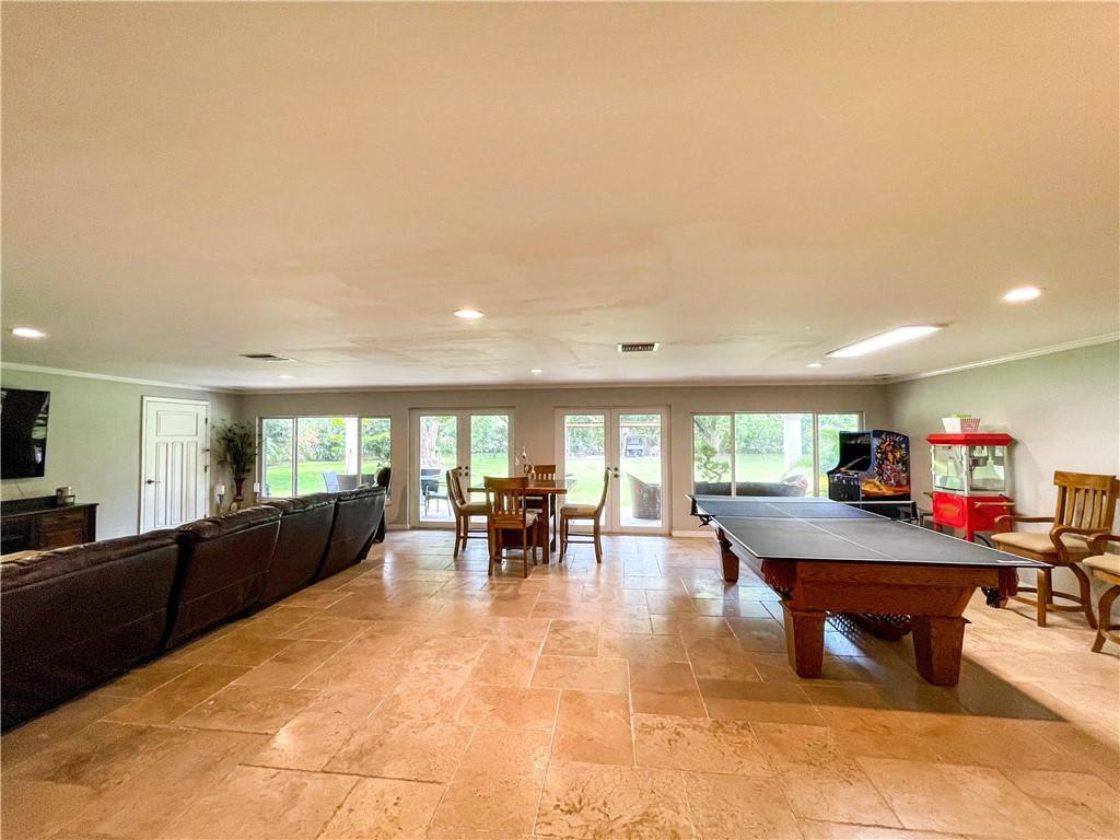 12990 Southwest 56th Street Southwest Ranches, FL 33330 - Photo 48 of 62 a view of a dining room with furniture