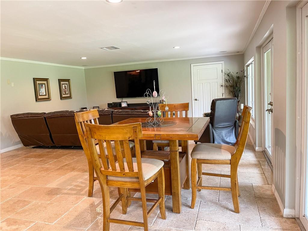 12990 Southwest 56th Street Southwest Ranches, FL 33330 - Photo 50 of 62 a view of a livingroom with furniture and a flat screen tv