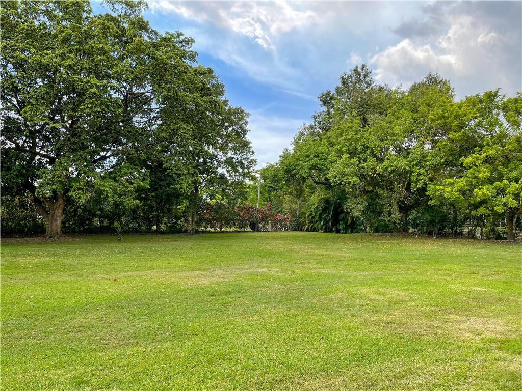 12990 Southwest 56th Street Southwest Ranches, FL 33330 - Photo 61 of 62 a view of a green yard