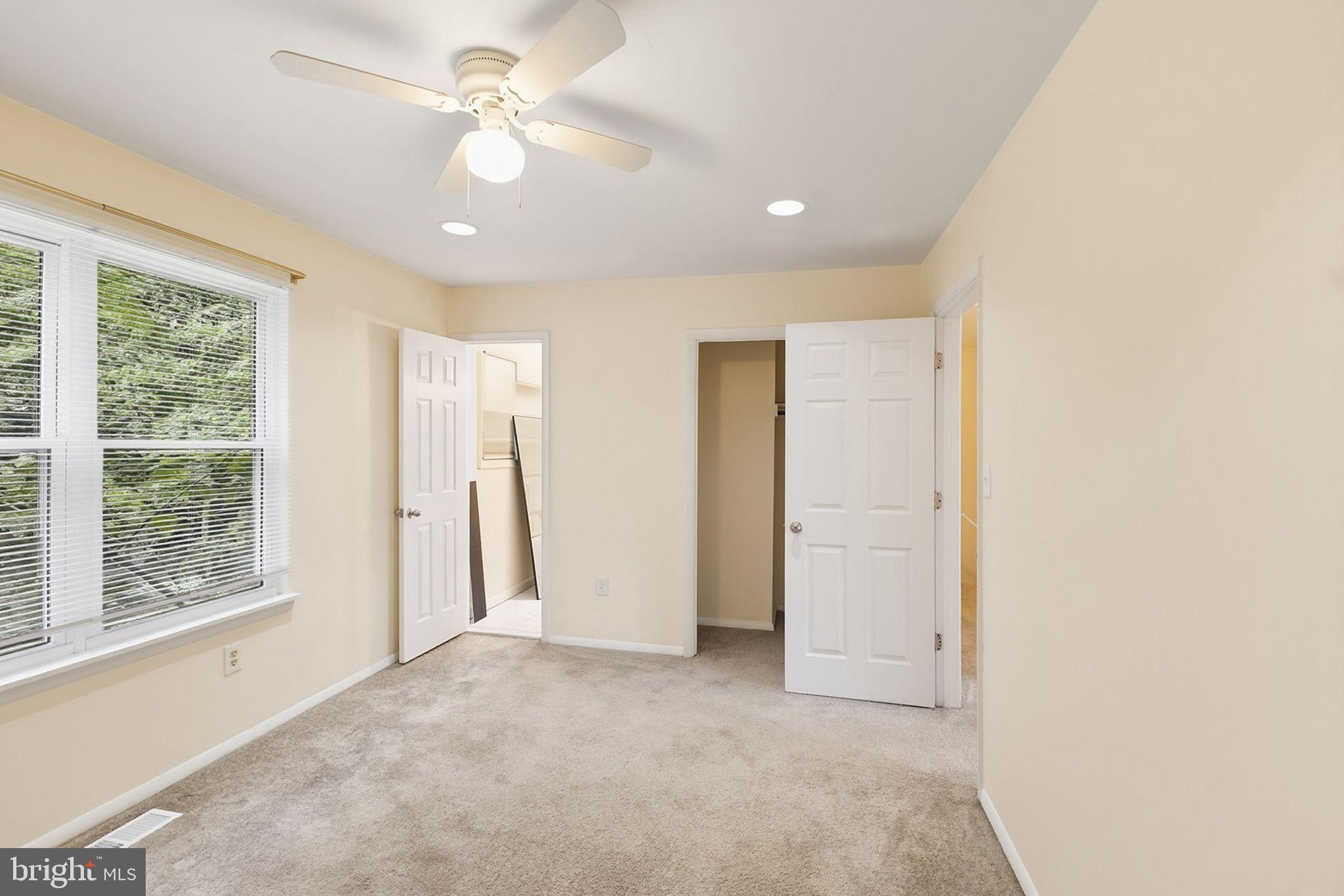 358 Kimwood Road Arnold, MD 21012 - Photo 11 of 15 a view of a livingroom with a ceiling fan and window