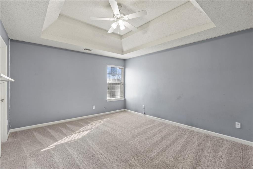 541 Hamlet Drive Hampton, GA 30228 - Photo 21 of 53 a view of an empty room with a window