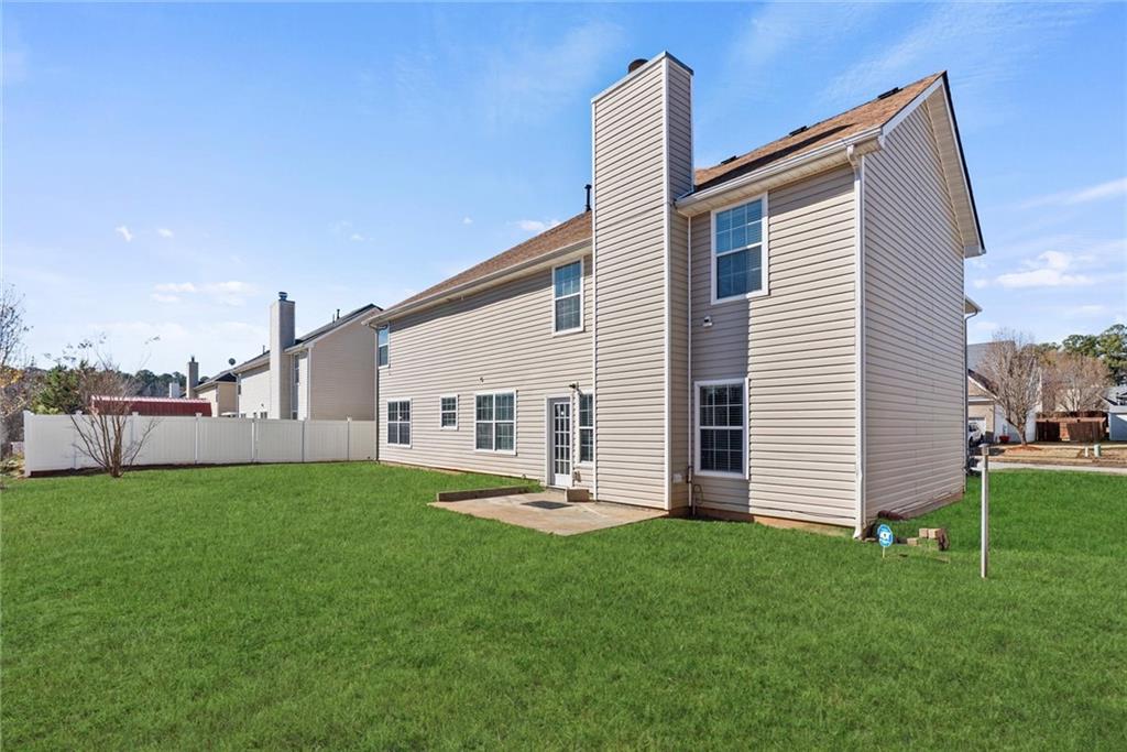 541 Hamlet Drive Hampton, GA 30228 - Photo 35 of 53 a view of a house with backyard