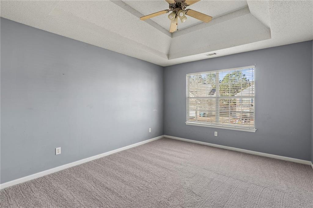 541 Hamlet Drive Hampton, GA 30228 - Photo 37 of 53 a view of an empty room with a window