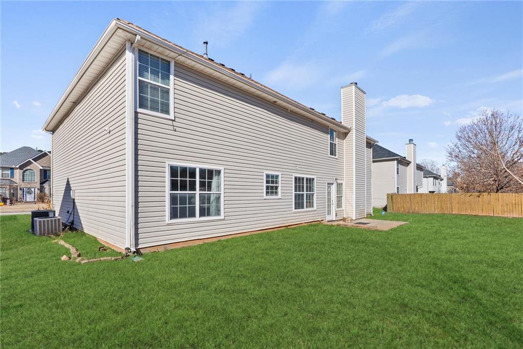 541 Hamlet Drive Hampton, GA 30228 - Photo 49 of 53 a front view of house with yard and green space