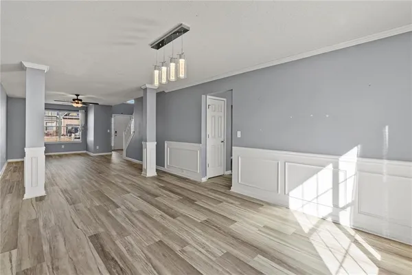 a kitchen with stainless steel appliances a refrigerator stove and oven