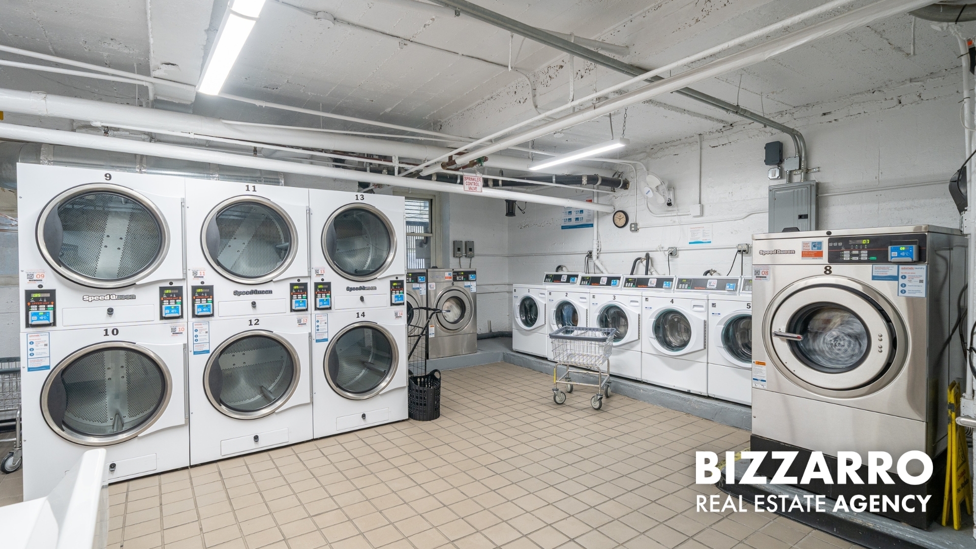 720 Fort Washington Avenue, Unit A Manhattan, NY 10040 - Photo 11 of 17 a utility room with dryer washer and a view of kitchen