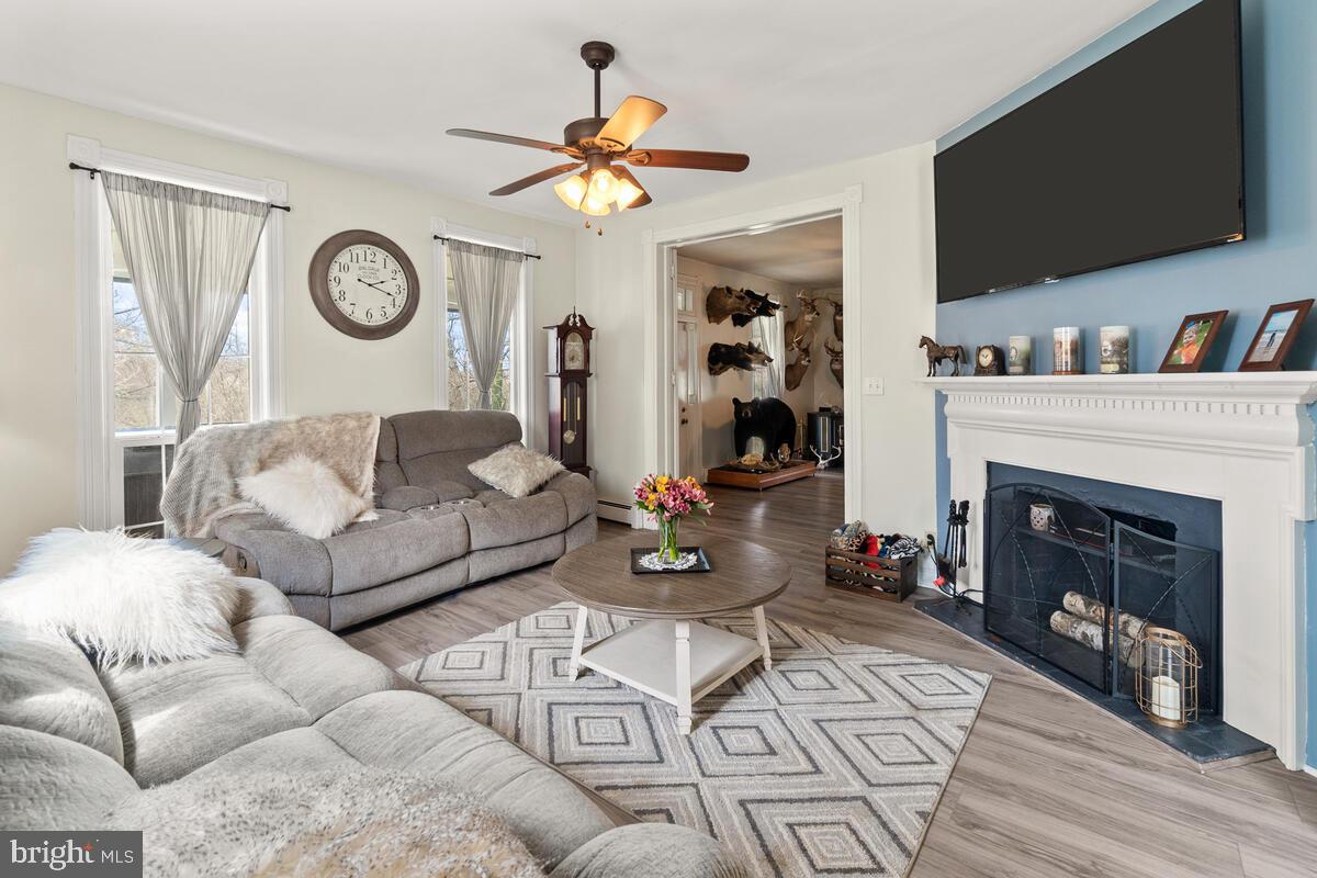 25526 Military Road Cascade, MD 21719 - Photo 7 of 59 Paddle fan and luxury vinyl