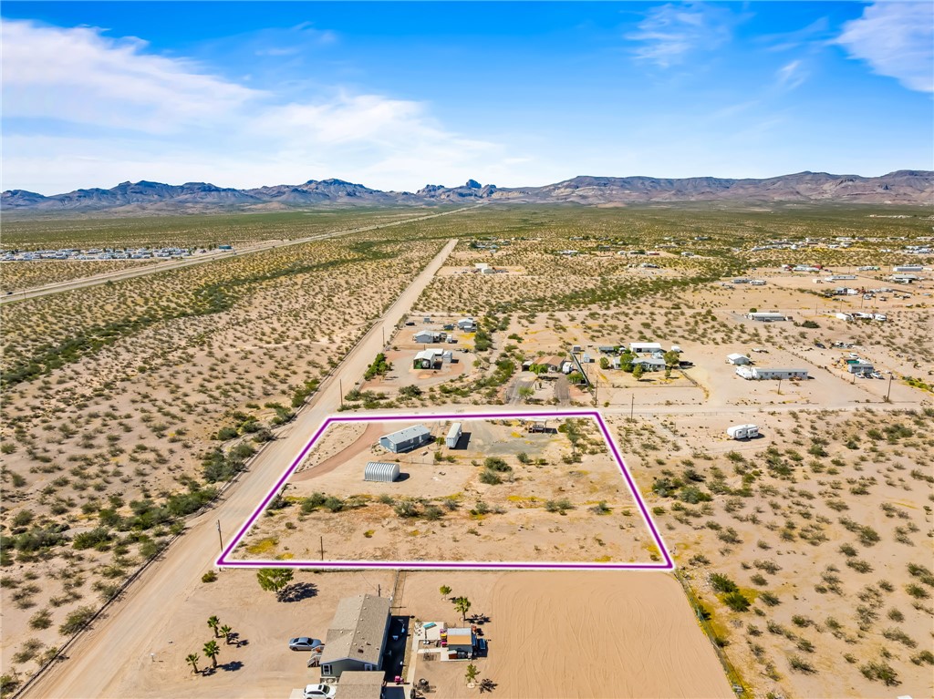 3534 Eloy Road Golden Valley, AZ 86413 - Photo 53 of 58 Overview of rural landscape with a mountainous background and property parcel outlined