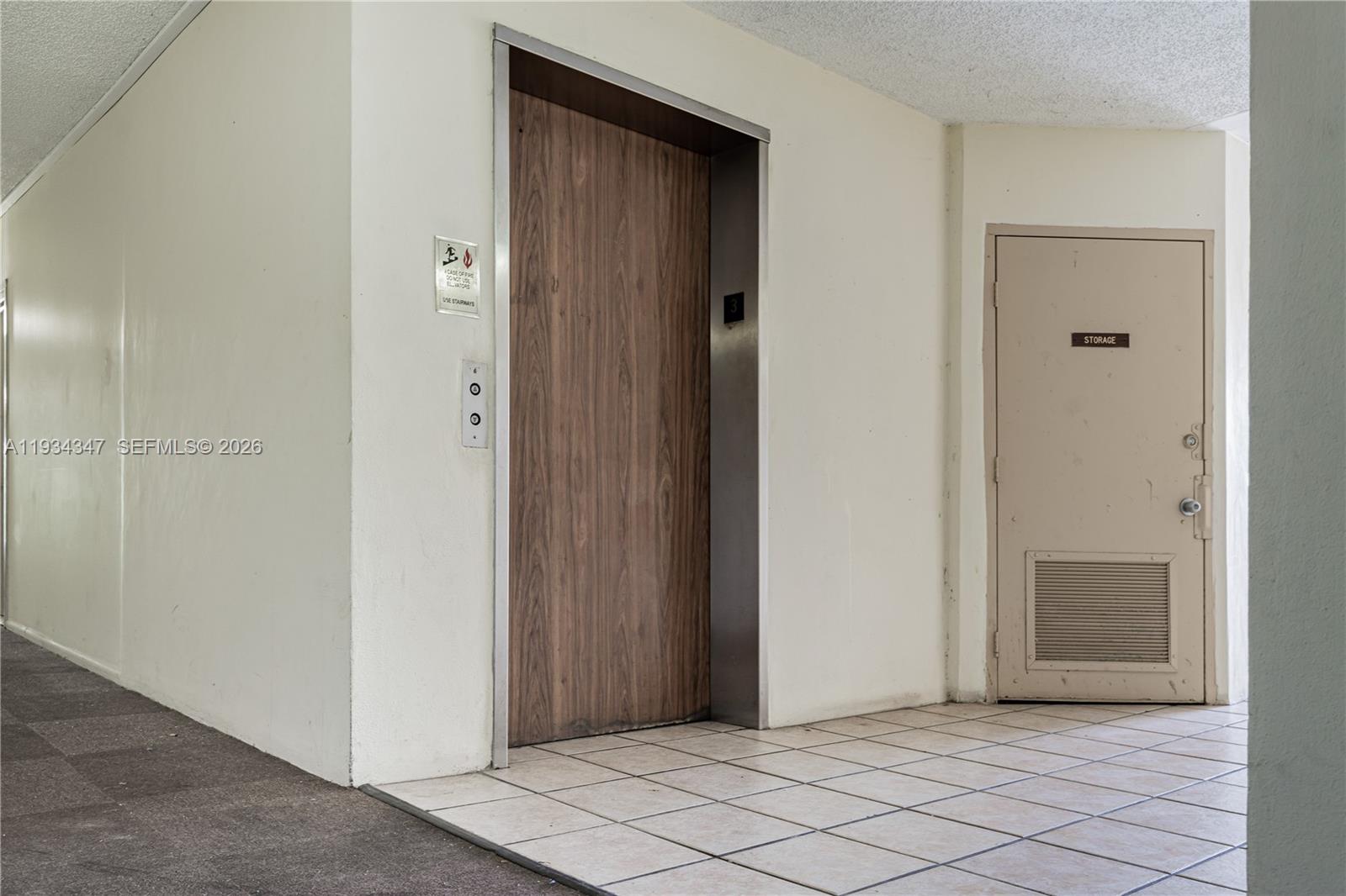 2501 Riverside Drive, Unit 307A Coral Springs, FL 33065 - Photo 2 of 28 a view of a hallway