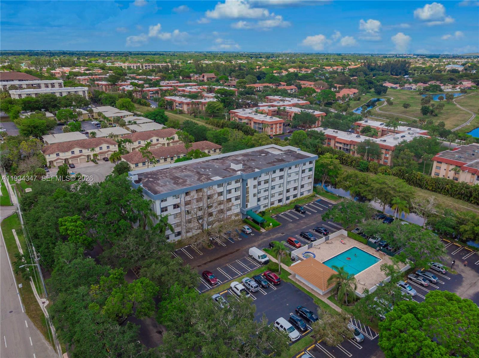 2501 Riverside Drive, Unit 307A Coral Springs, FL 33065 - Photo 24 of 28 an aerial view of a city