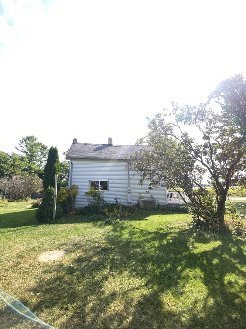 25914 Perkins Road Harvard, IL 60033 - Photo 3 of 6 a view of a house with a yard