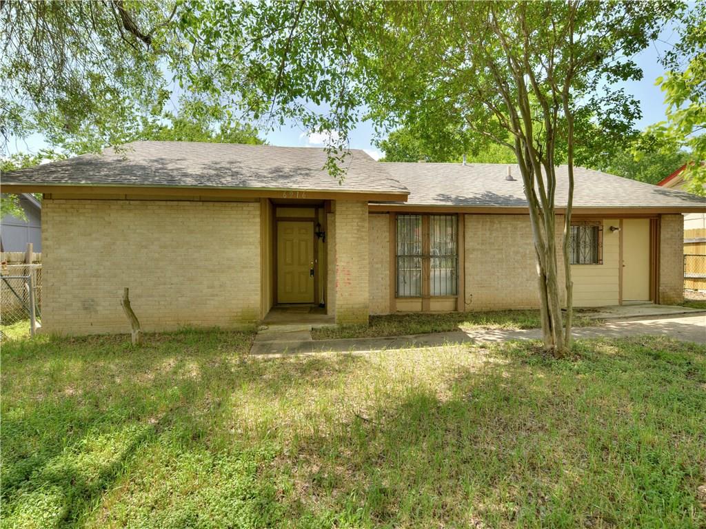 6916 Carwill Drive Austin, TX 78724 - Photo 1 of 1 Ranch-style home featuring brick siding, a front yard, fence, and roof with shingles