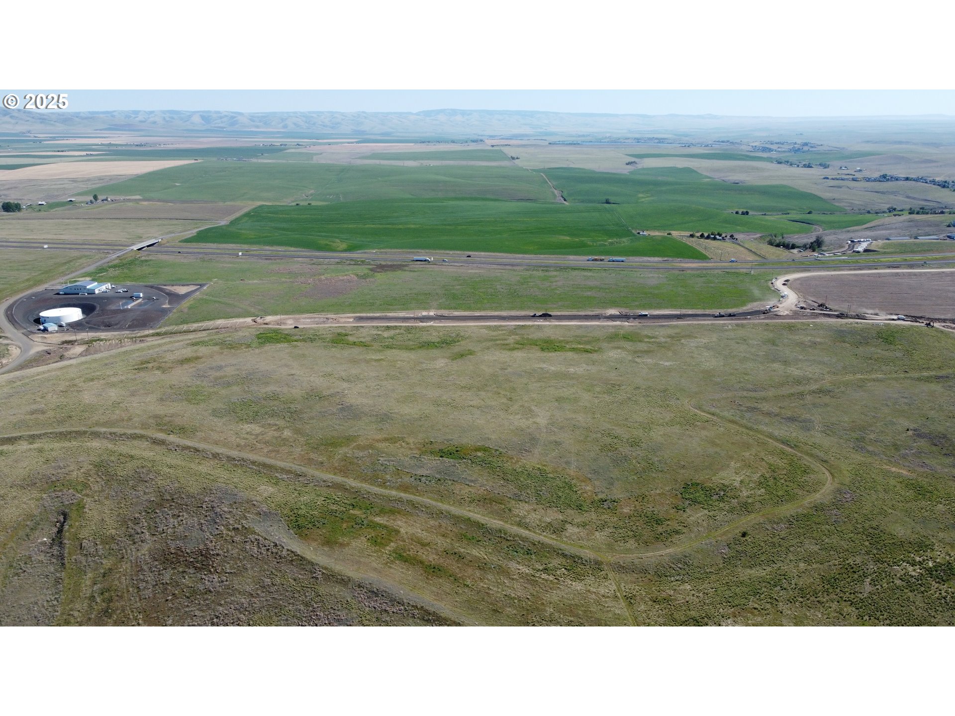 1110 Goad Road, Unit 1002 Pendleton, OR 97801 - Photo 8 of 10 a black and white photo of a field