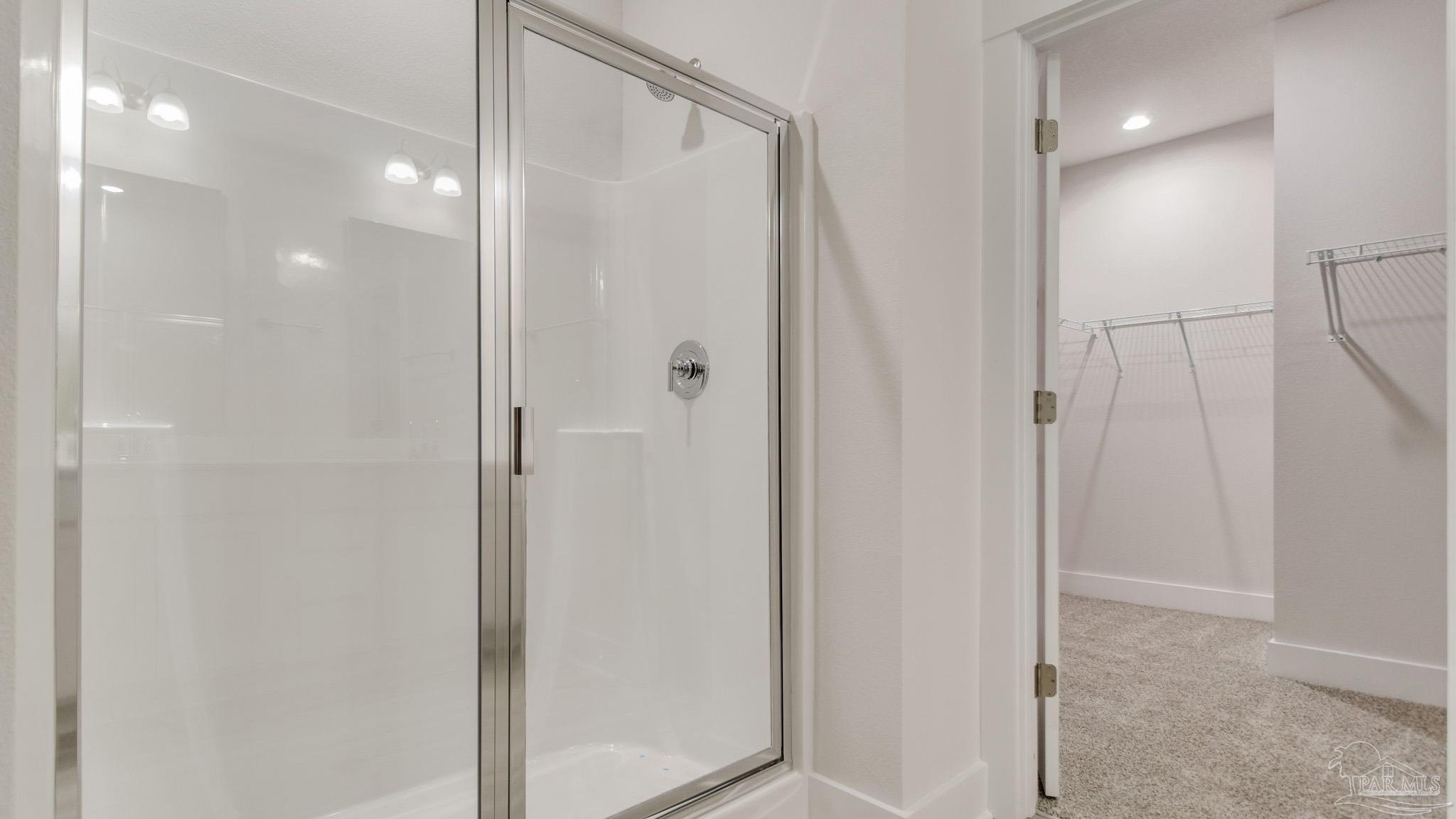 2733 Chevy Circle Pace, FL 32571 - Photo 22 of 37 a bathroom with a shower and a glass door