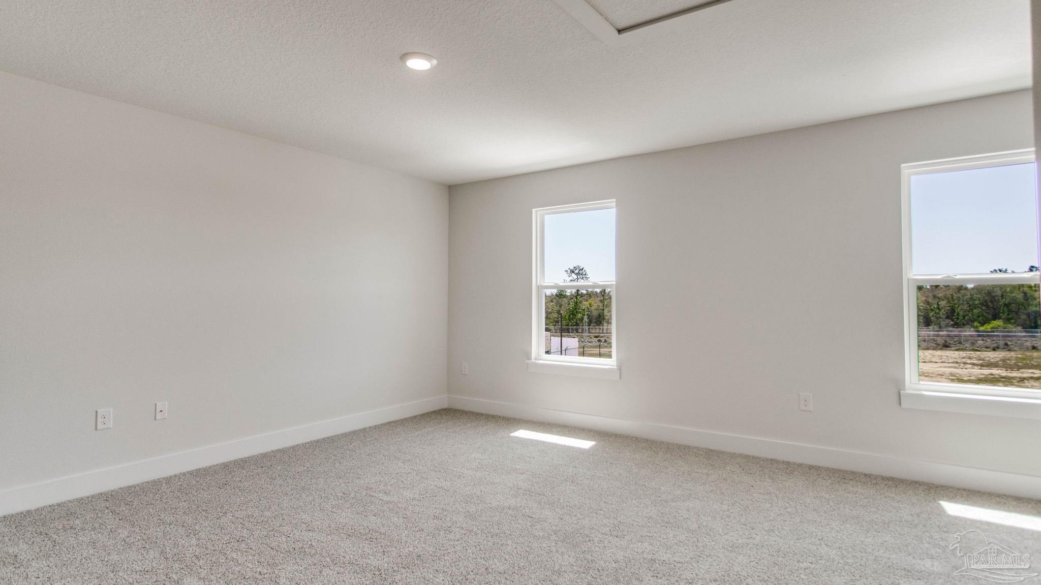 2733 Chevy Circle Pace, FL 32571 - Photo 28 of 37 an empty room with windows