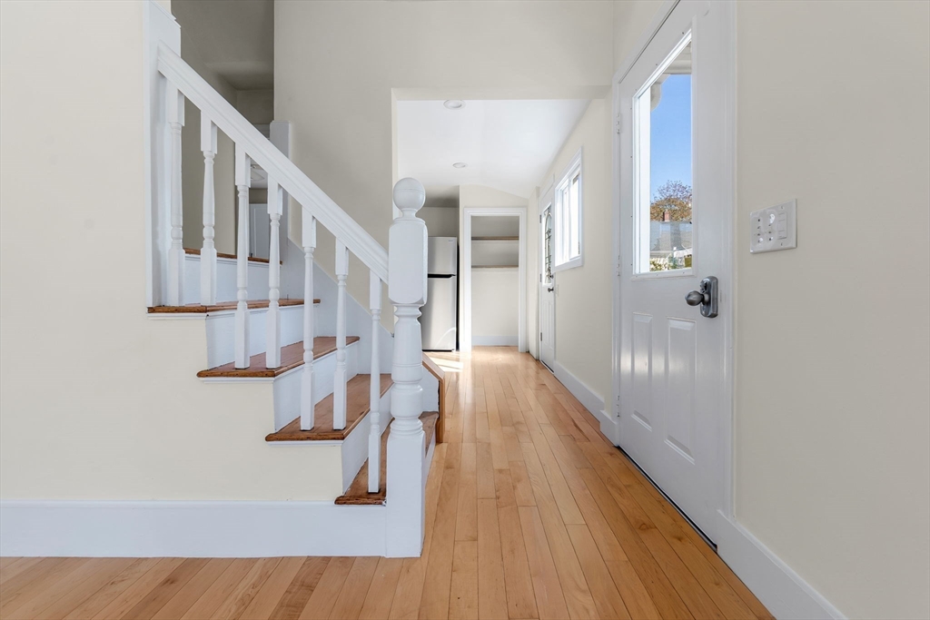 14 1/2 Hampshire Street Danvers, MA 01923 - Photo 11 of 37 a view of entryway and hall with wooden floor