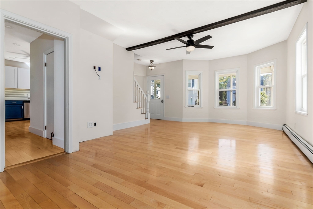 14 1/2 Hampshire Street Danvers, MA 01923 - Photo 14 of 37 wooden floor in an empty room with a window
