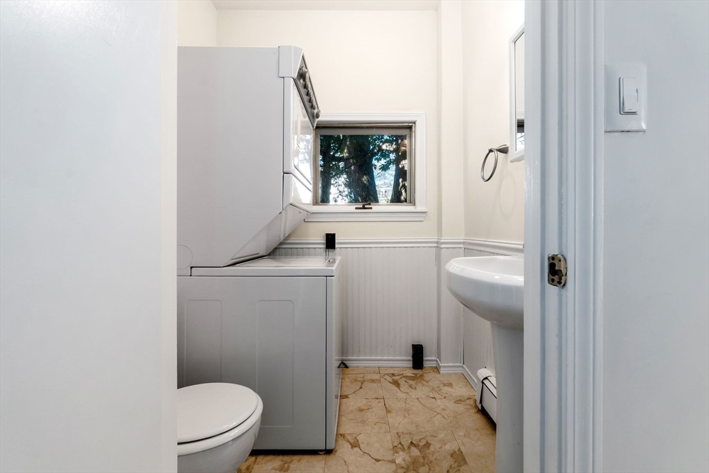 14 1/2 Hampshire Street Danvers, MA 01923 - Photo 16 of 37 a bathroom with a toilet and a shower