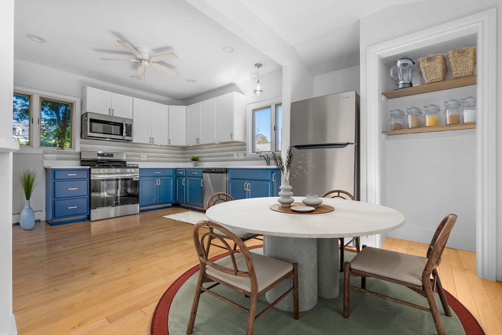 14 1/2 Hampshire Street Danvers, MA 01923 - Photo 4 of 37 a view of kitchen with cabinets and wooden floor