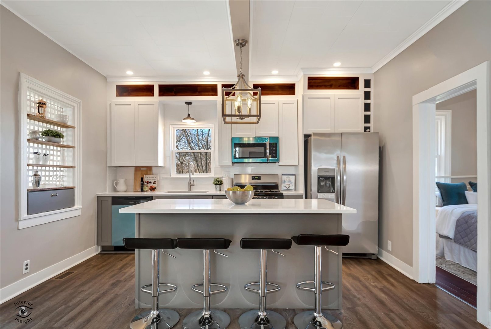 714 Gould Street Beecher, IL 60401 - Photo 12 of 29 a kitchen with stainless steel appliances a table chairs refrigerator and sink